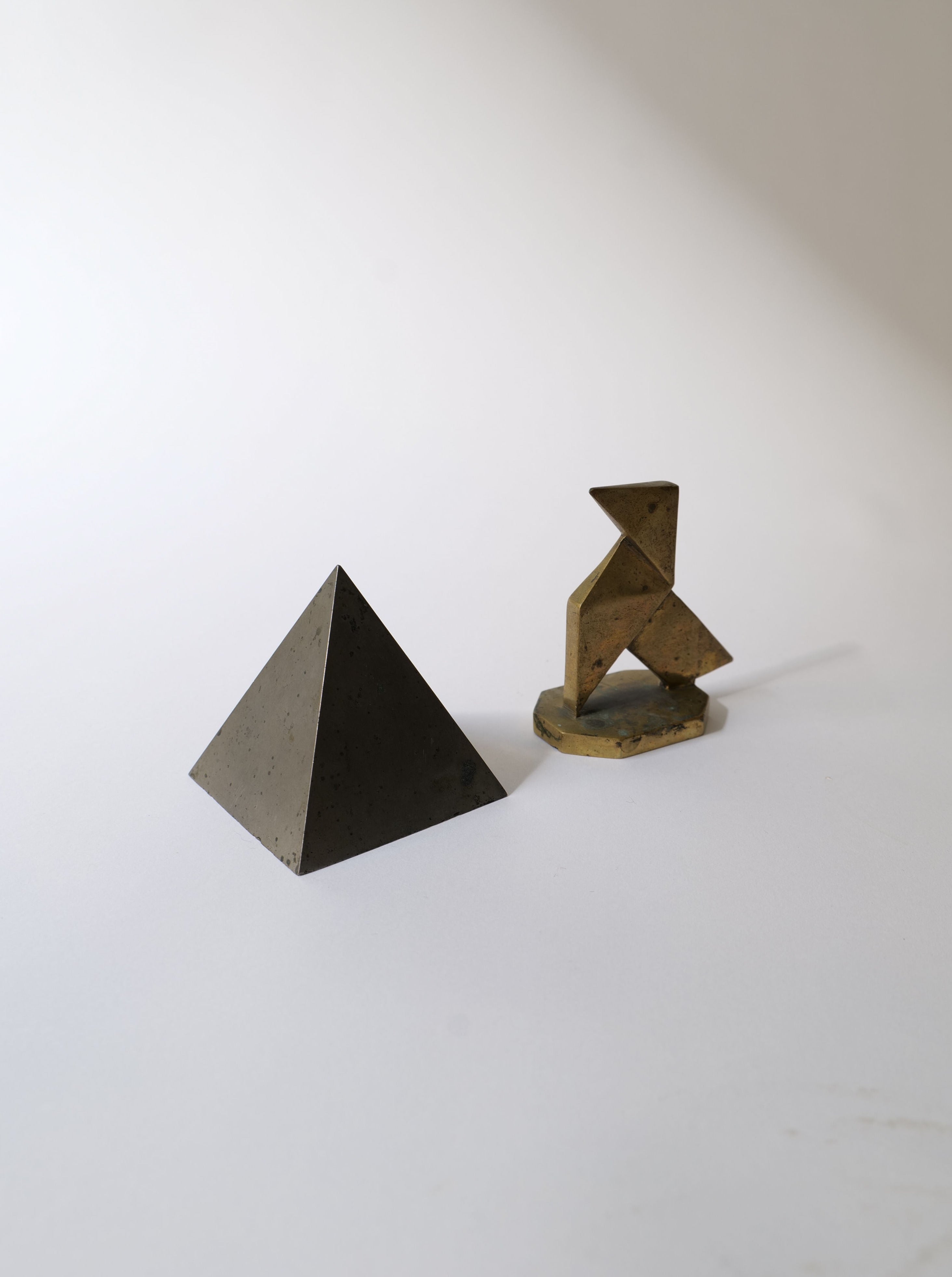 Pair of Bronze Geometric Paperweights